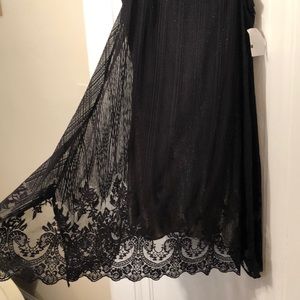 Gorgeous lace black dress with gold layer